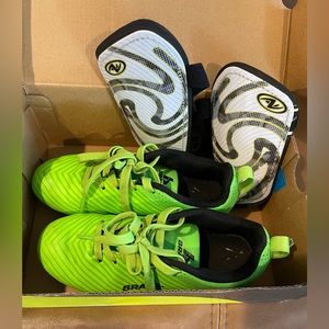 Kids soccer cleats and shin guards